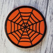 Декоративна серветка з вишивкою, помаранчево-чорна